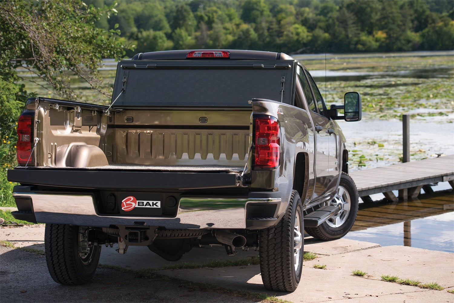 https://www.catalograck.com/ImgVDHR/BAK/BK_BakFlip_FiberMax_Silverado_at_dock_H.jpg